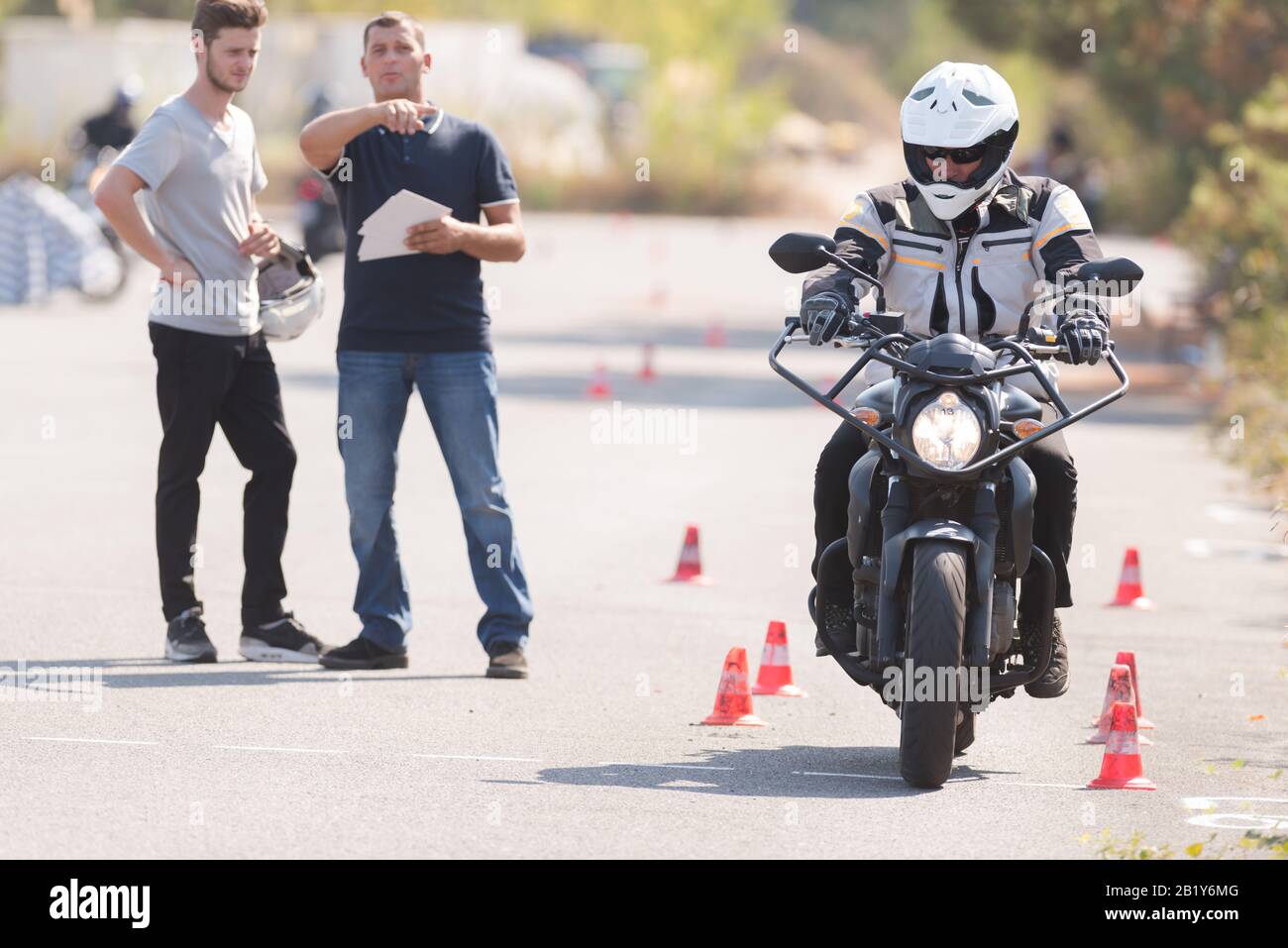 motorcyclist during driving lesson on motordrome Stock Photo