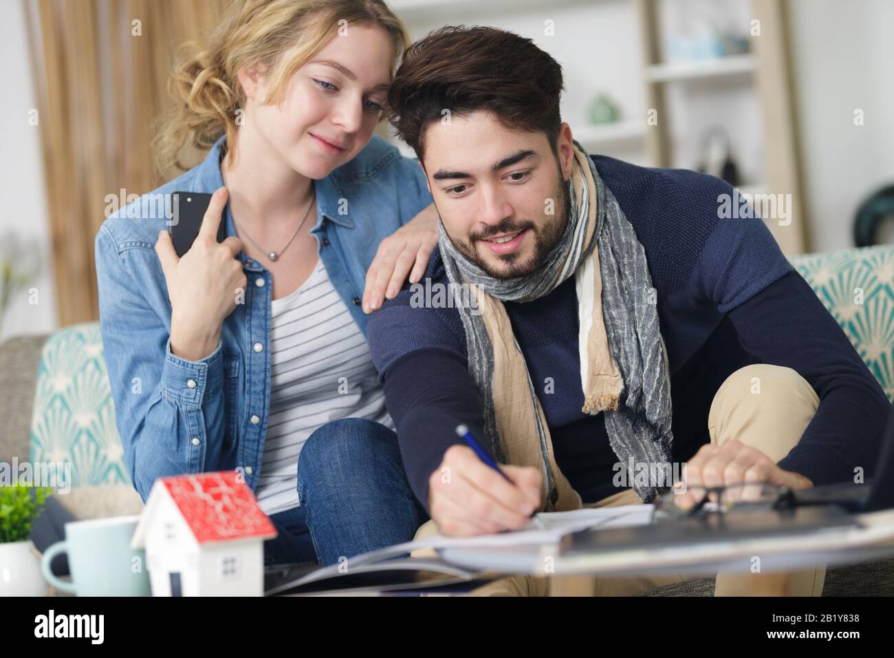 couple moving into a new house Stock Photo - Alamy