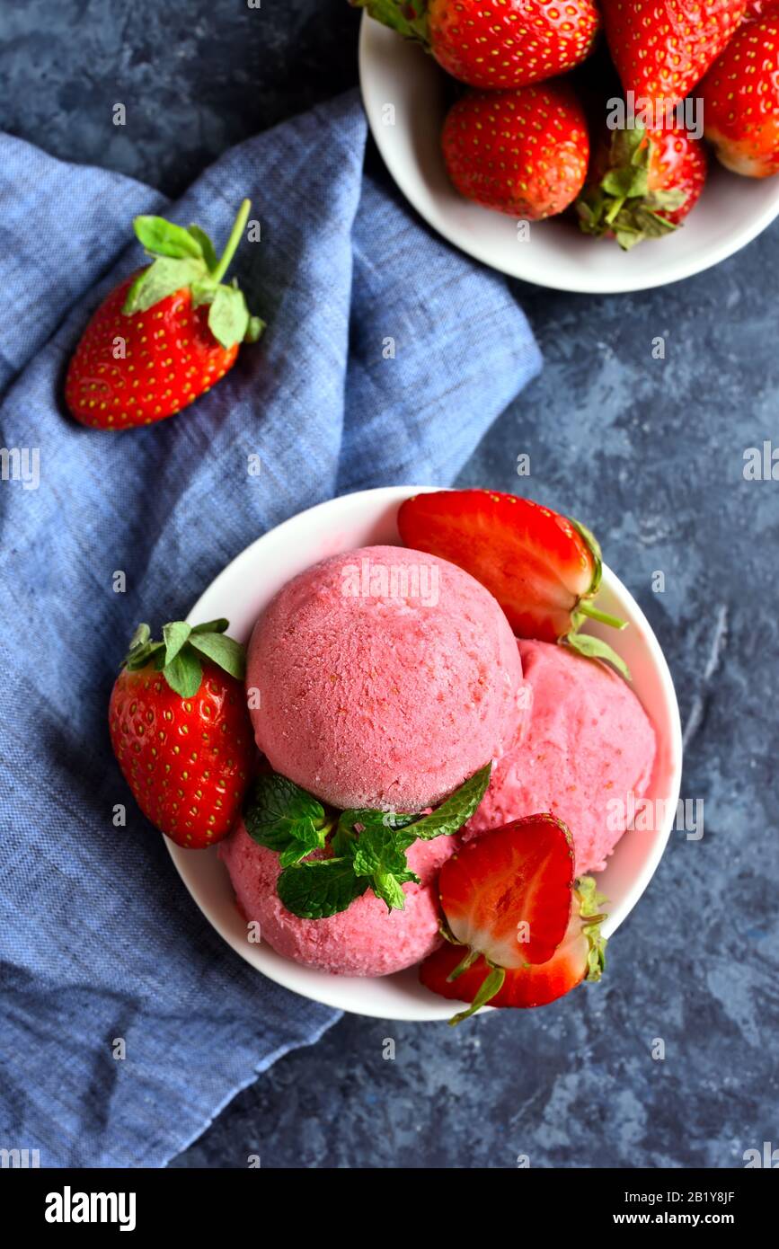 Fresh strawberry ice cream in waffle cone Stock Photo - Alamy