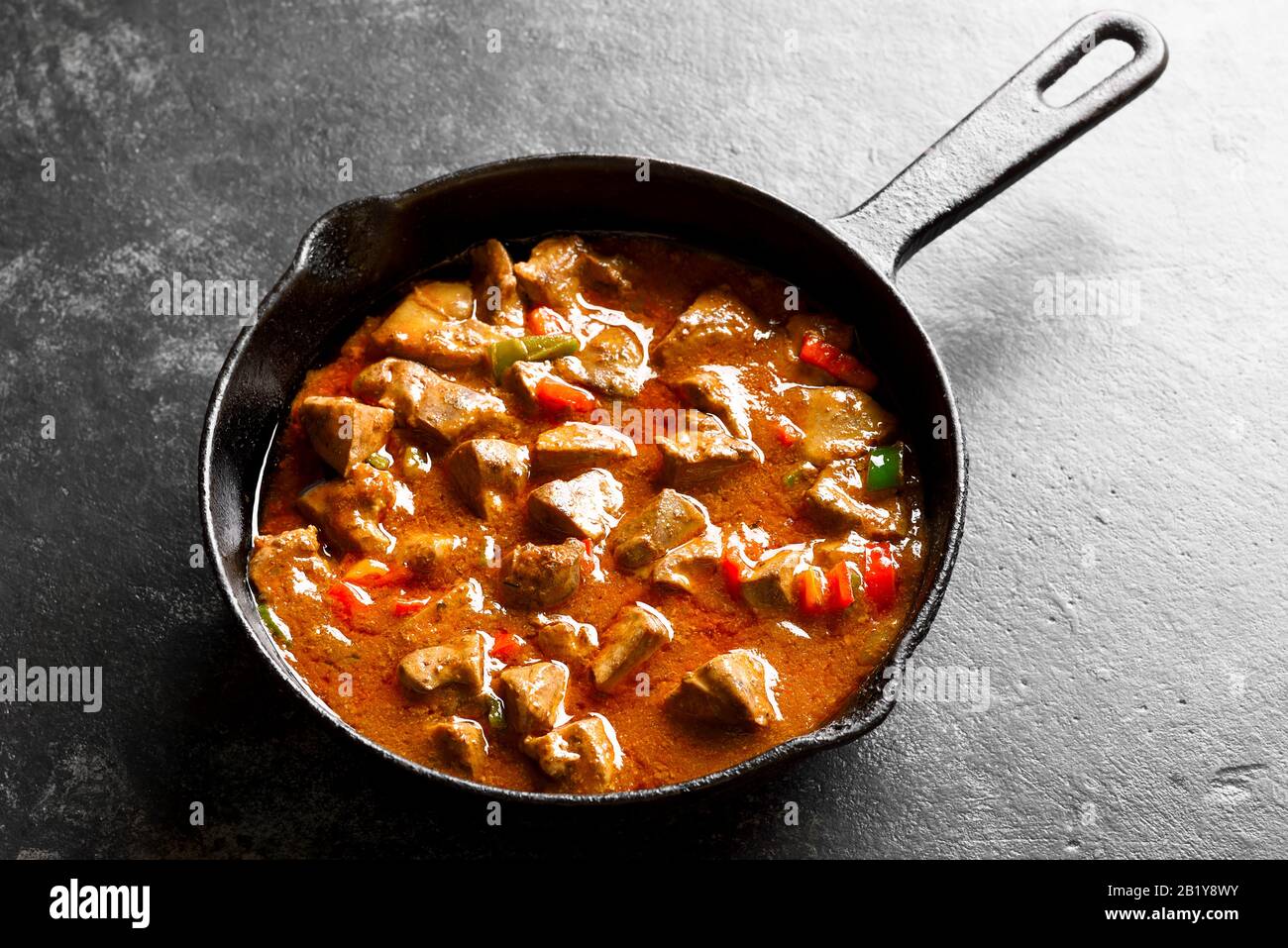 Periperi chicken livers in frying pan over dark stone background. Close up view Stock Photo Alamy