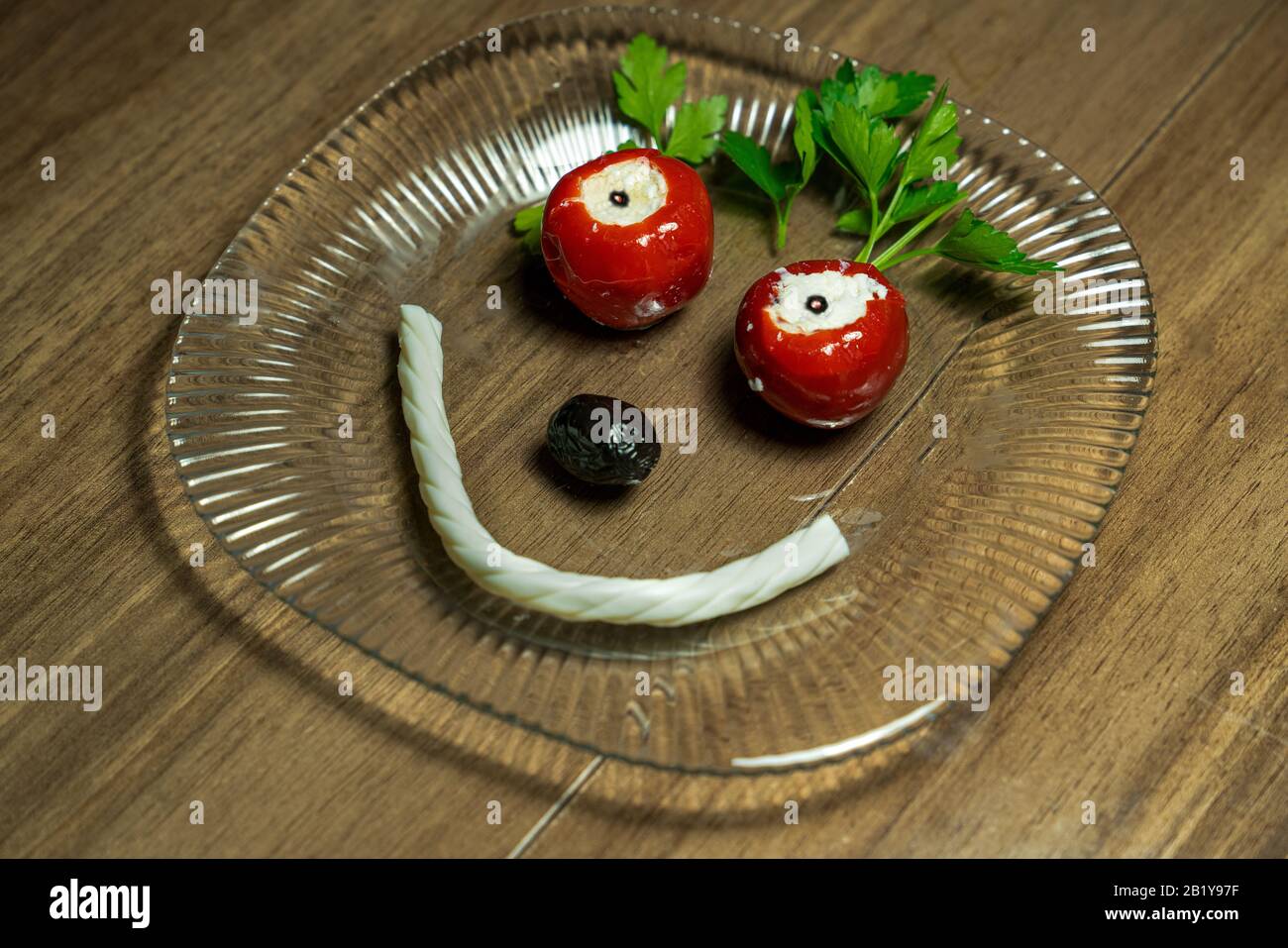 Funny bowls with cheese, olive and parsley, food for kids idea, top