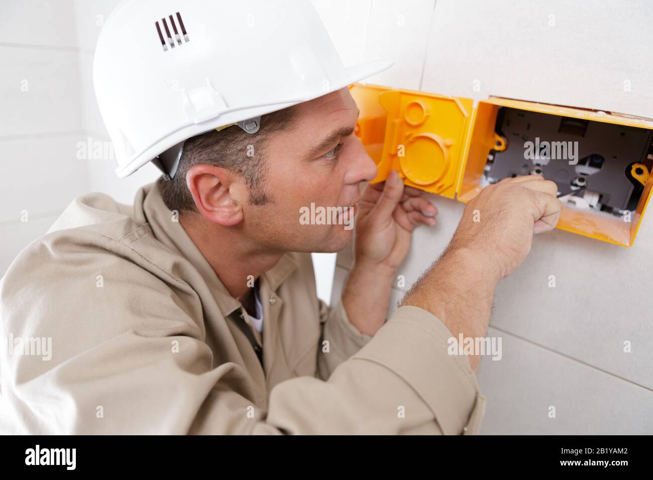 opening unsafe power point with electric connection Stock Photo