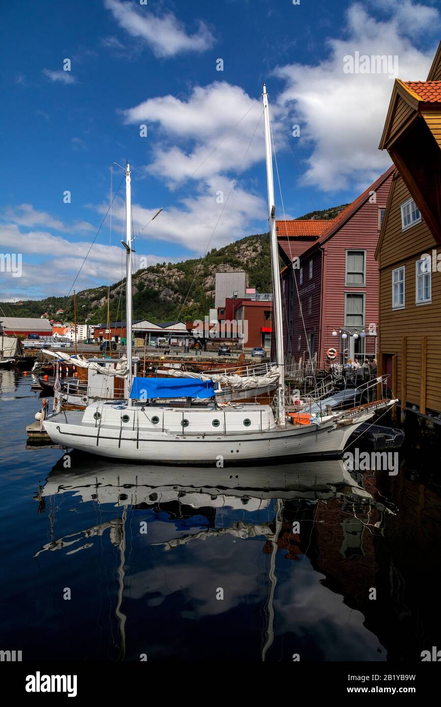 sailboat Krähennest and some veteran fishing vessels moored at Norwegian Fishery Museum in Sandviken, Bergen, Norway. Stock Photo