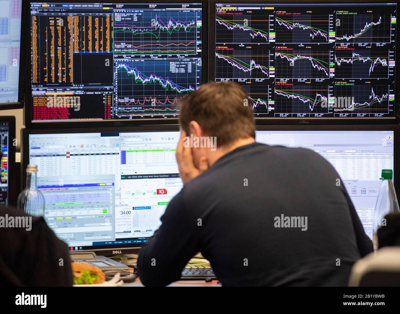 Frankfurt Germany 28th Feb 2020 An Exchange Trader At The Frankfurt Stock Exchange Looks At His Monitors The Most Important German Leading Index The Dax Fell By More Than 5 Percent In
