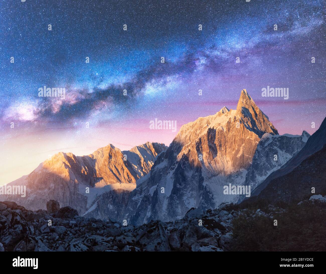 Milky Way over beautiful mountains at night. Sace landscape Stock Photo