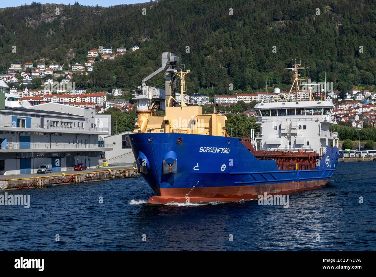 General cargo vessel Borgenfjord departing from the inner part of the port of Bergen, Norway. Vessel ex Eiland ex Huelin Dispatch. Passing Skolten ter Stock Photo