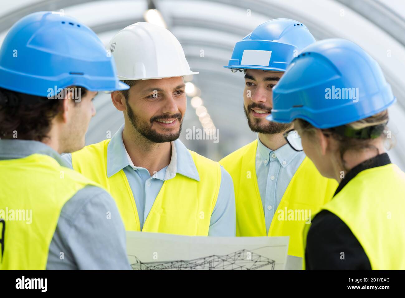 four engineers discussing about a new project Stock Photo
