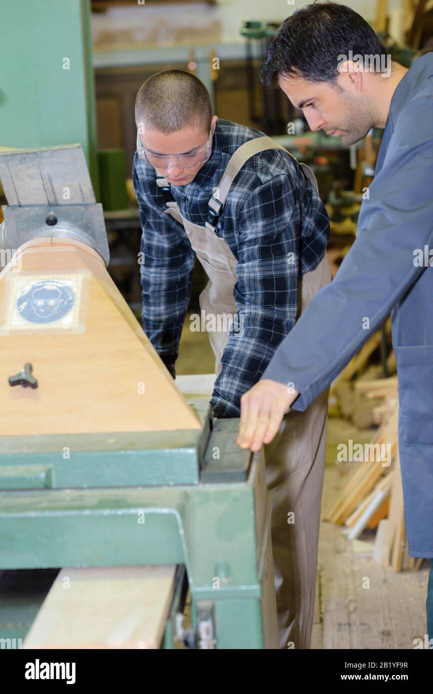 working together in workshop with precision tools Stock Photo