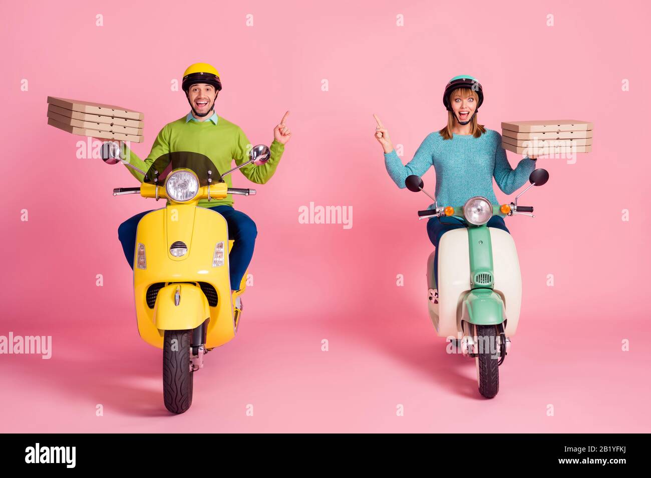 Full length photo of funny crazy lady guy drive two vintage moped carry