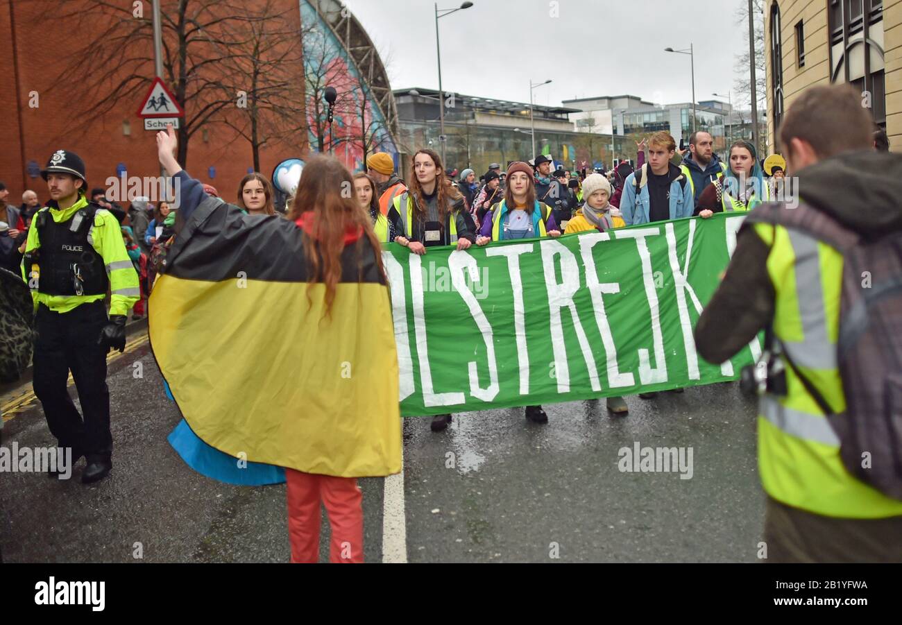 Environmental activist Greta Thunberg (centre right) marches during a Youth Strike 4 Climate protest in Bristol. Stock Photo