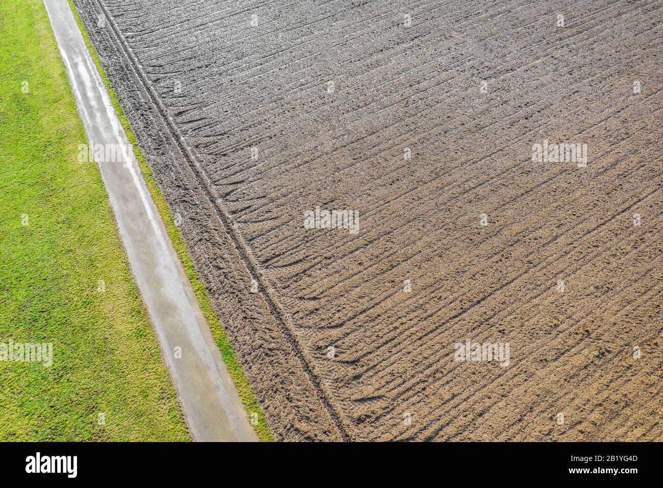 a field with tractor paths from above Stock Photo - Alamy