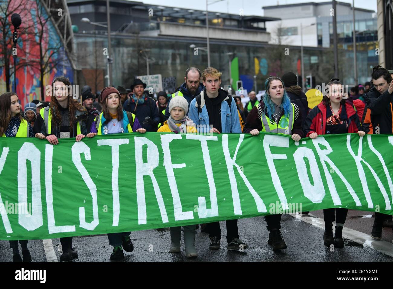Environmental activist Greta Thunberg (centre) marches during a Youth Strike 4 Climate protest in Bristol. Stock Photo