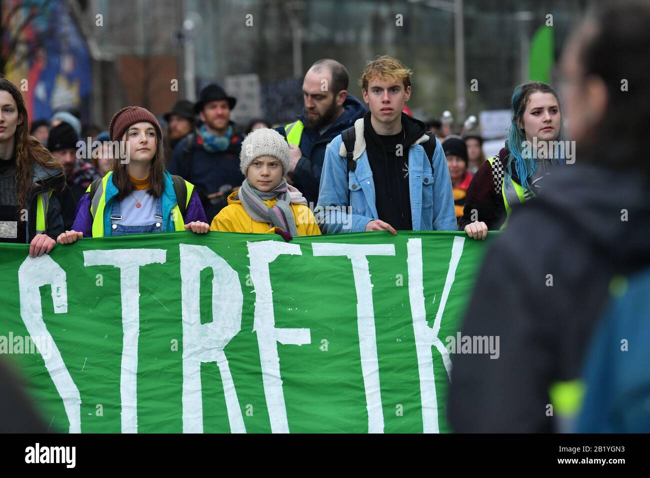 Environmental activist Greta Thunberg (centre) marches during a Youth Strike 4 Climate protest in Bristol. Stock Photo