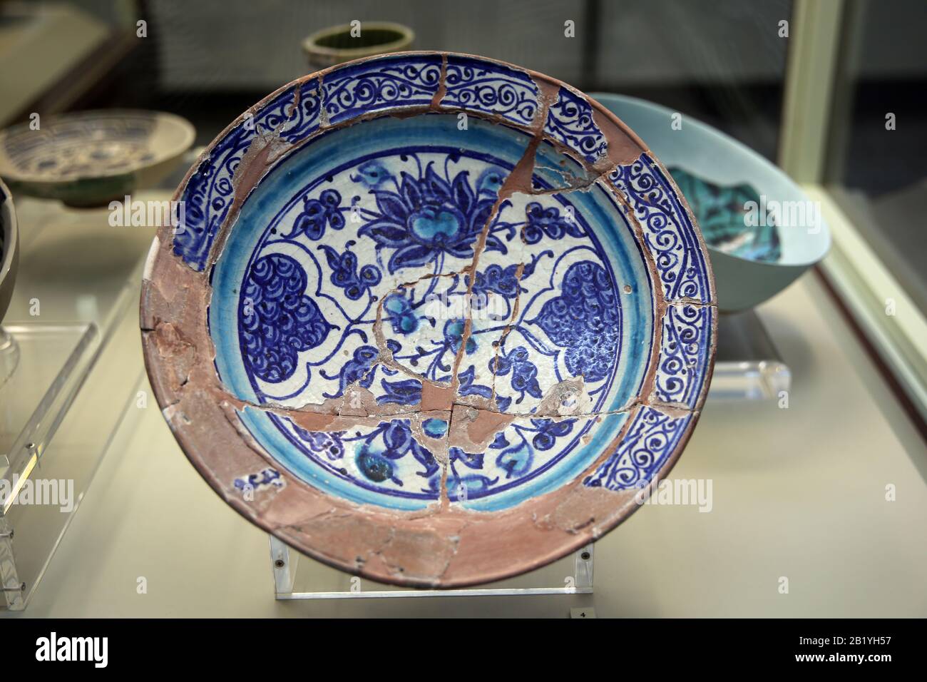 Miletus Ware. Plate. 14th-15th century. Produced in Iznik. Geometrical and vegetal motifs. Blue color. Istanbul Archaeology Museums. Museum of Islamic Stock Photo