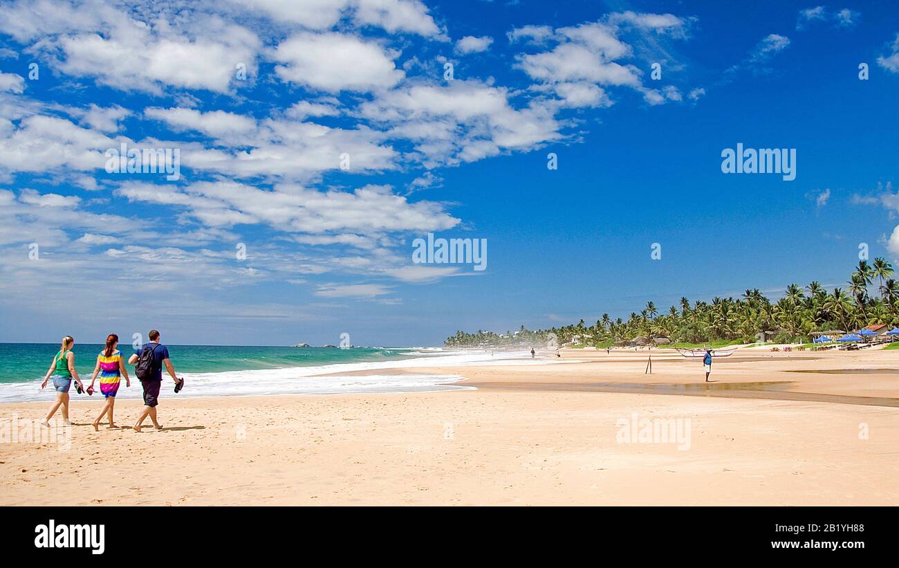 Tourists Narigama Beach, Hikkaduwa, Sri Lanka Stock Photo