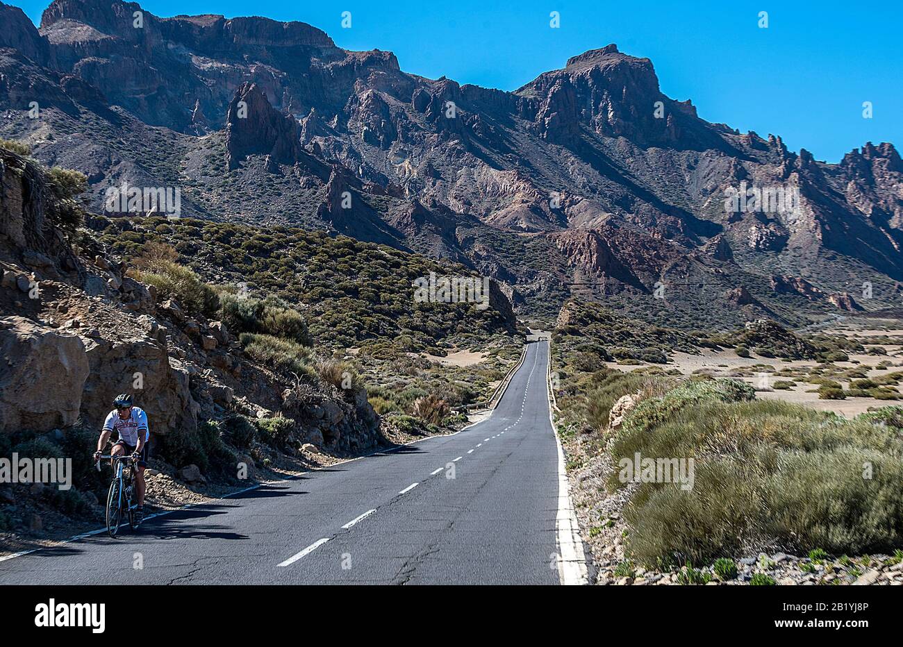 Cyclist on the road to Mount Teide, Tenerife, Canary Islands, Spain Stock Photo