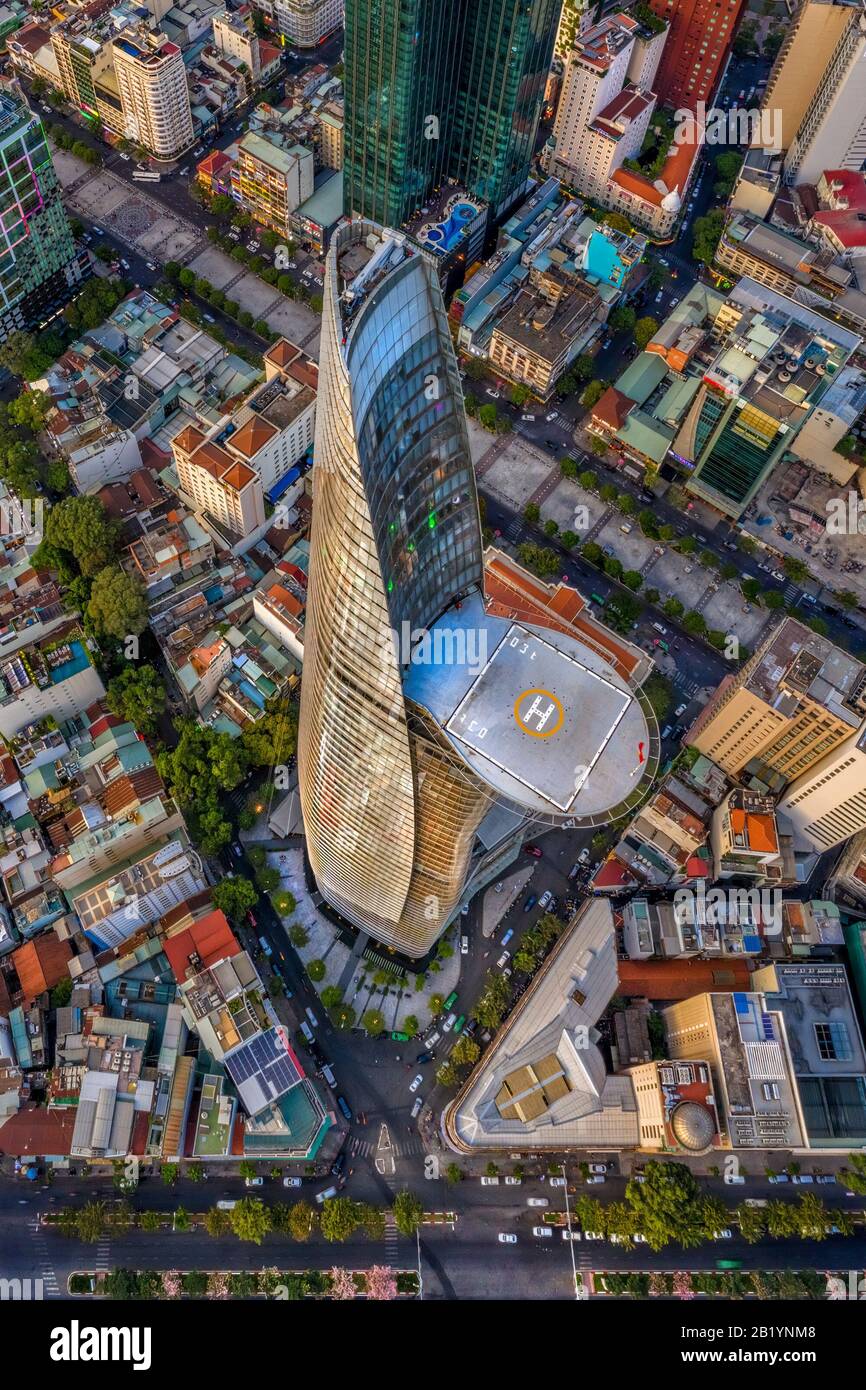 Aerial panoramic cityscape view of HoChiMinh City and Bitexco tower , Vietnam with blue sky at sunset. Stock Photo