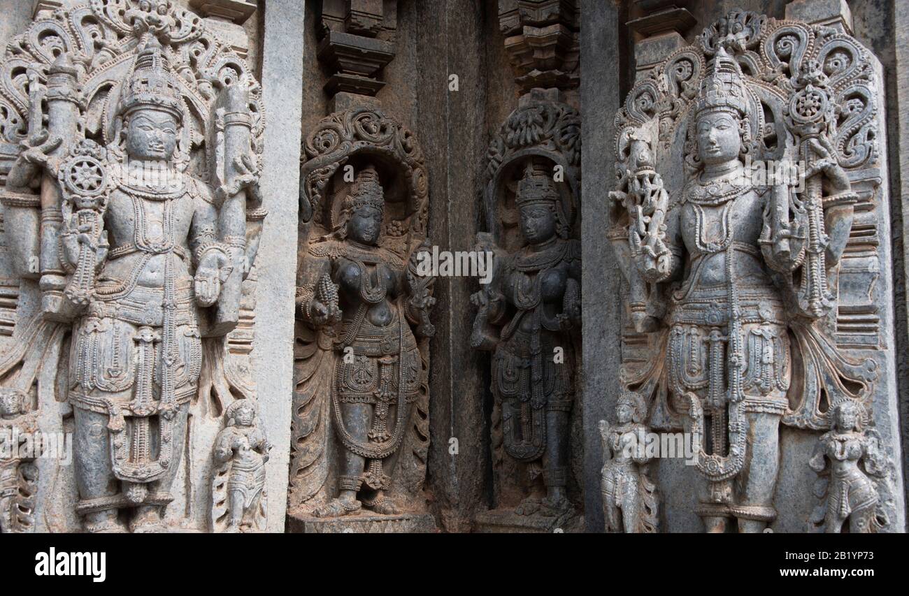 Carved idols on the outer wall of the Chennakesava Temple, Somanathapura, Karnataka, India Stock Photo