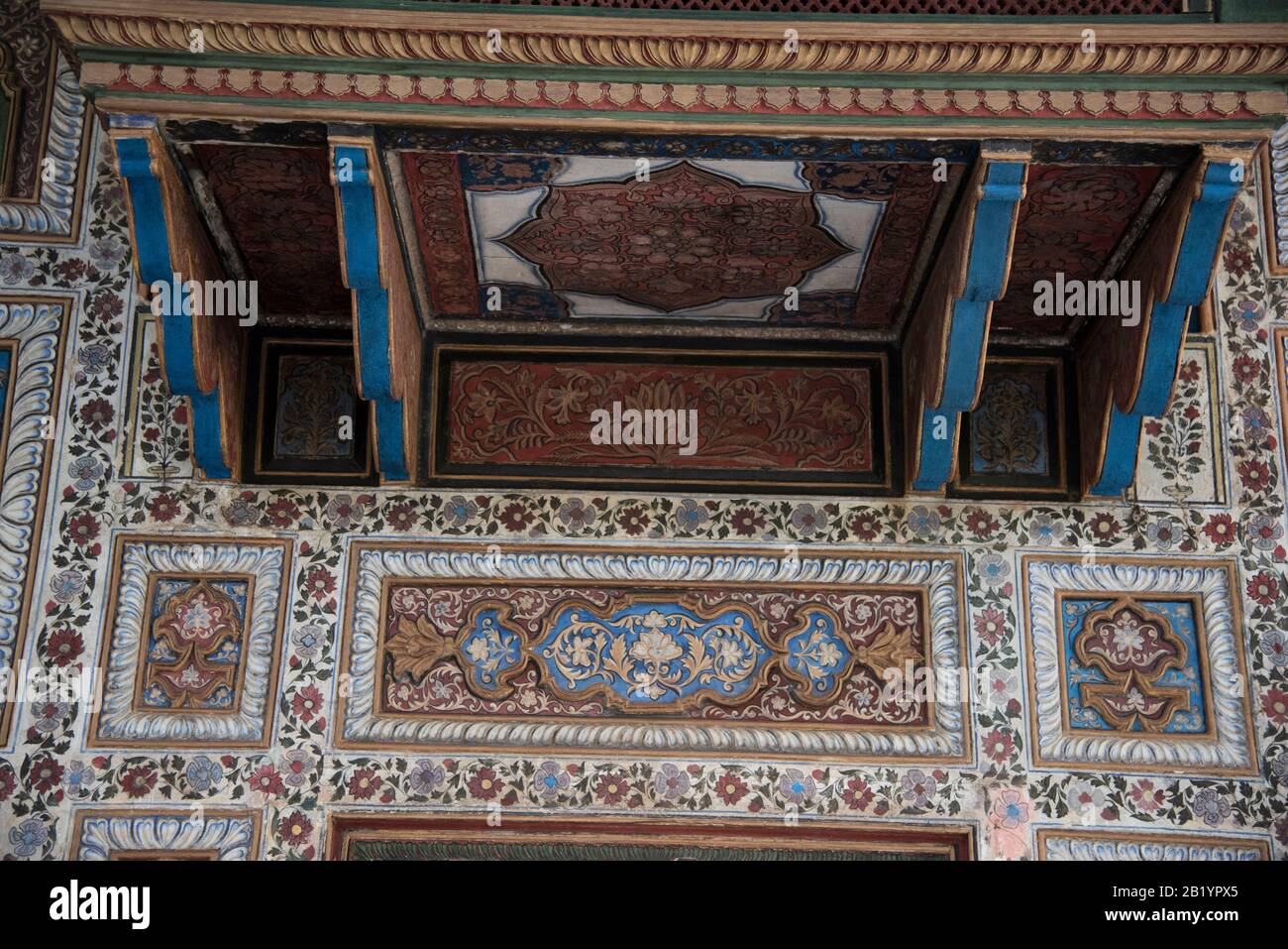 Colorful frescoes in the style of Mysore paintings on the walls