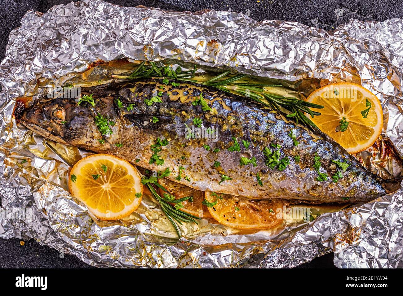 Mackerel baked in foil with spices, top view Stock Photo Alamy