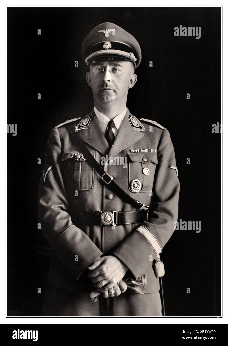 Heinrich Himmler Archive Portrait 1940 Reichsführer Heinrich Himmler, Chief of police and SS in the Third Reich. Portrait photo taken on the occasion of his 40th birthday. Heinrich Luitpold Himmler was Reichsführer of the Schutzstaffel, and a leading member of the Nazi Party of Germany. Himmler was one of the most powerful men in Nazi Germany and a main architect of the Holocaust. Undoubtedly guilty of war crimes against humanity, committed suicide whilst in custody awaiting trial. Stock Photo