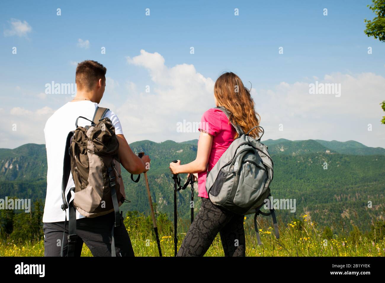 Active Beautiful Young Couple Hiking Ina Nature Climbing Hill Or 