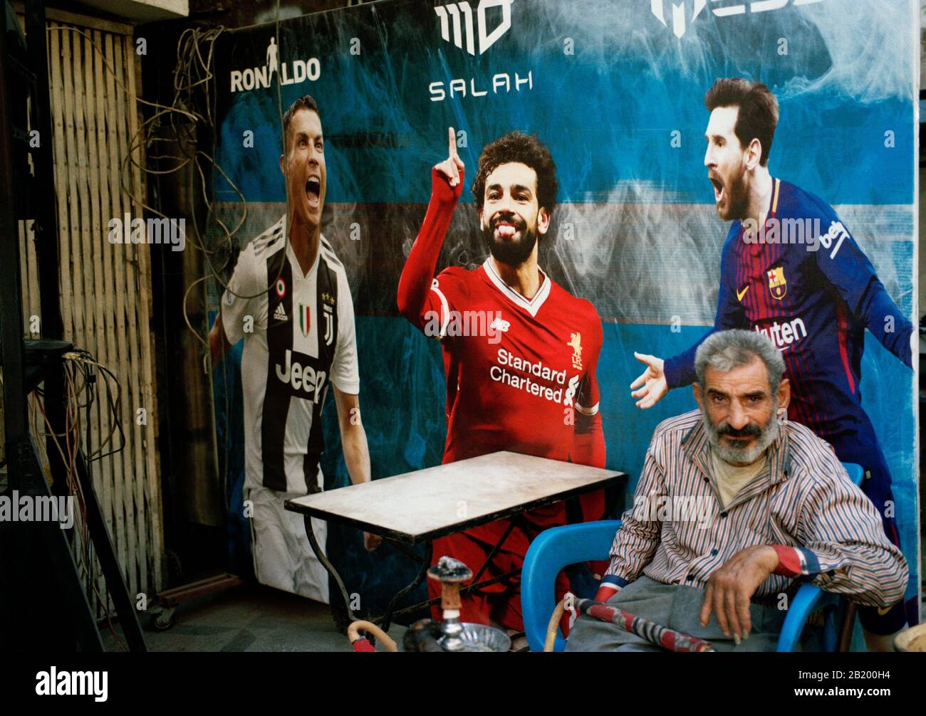 Travel Photography - Street scene showing football icons in Islamic Cairo district of the city of Cairo in Egypt in North Africa. Legend Stock Photo