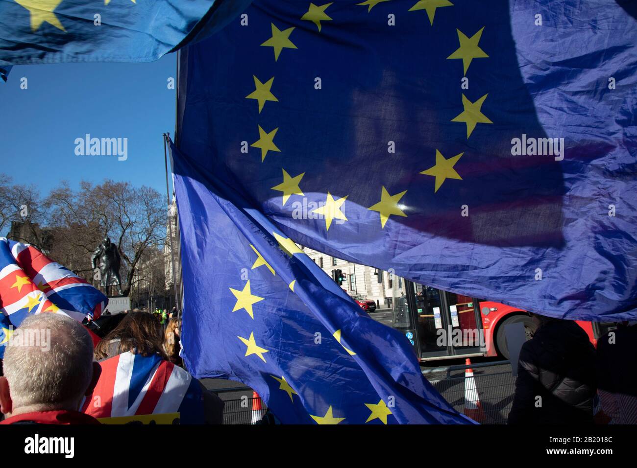 Anti Brexit protesters with European Union flags protest as Prime Ministers questions is due to start in Westminster outside Parliament on 29th January 2020 in London, England, United Kingdom. With only two days until the UK is due to leave the EU, these will be some of the last protests with the UK as a European nation. Stock Photo