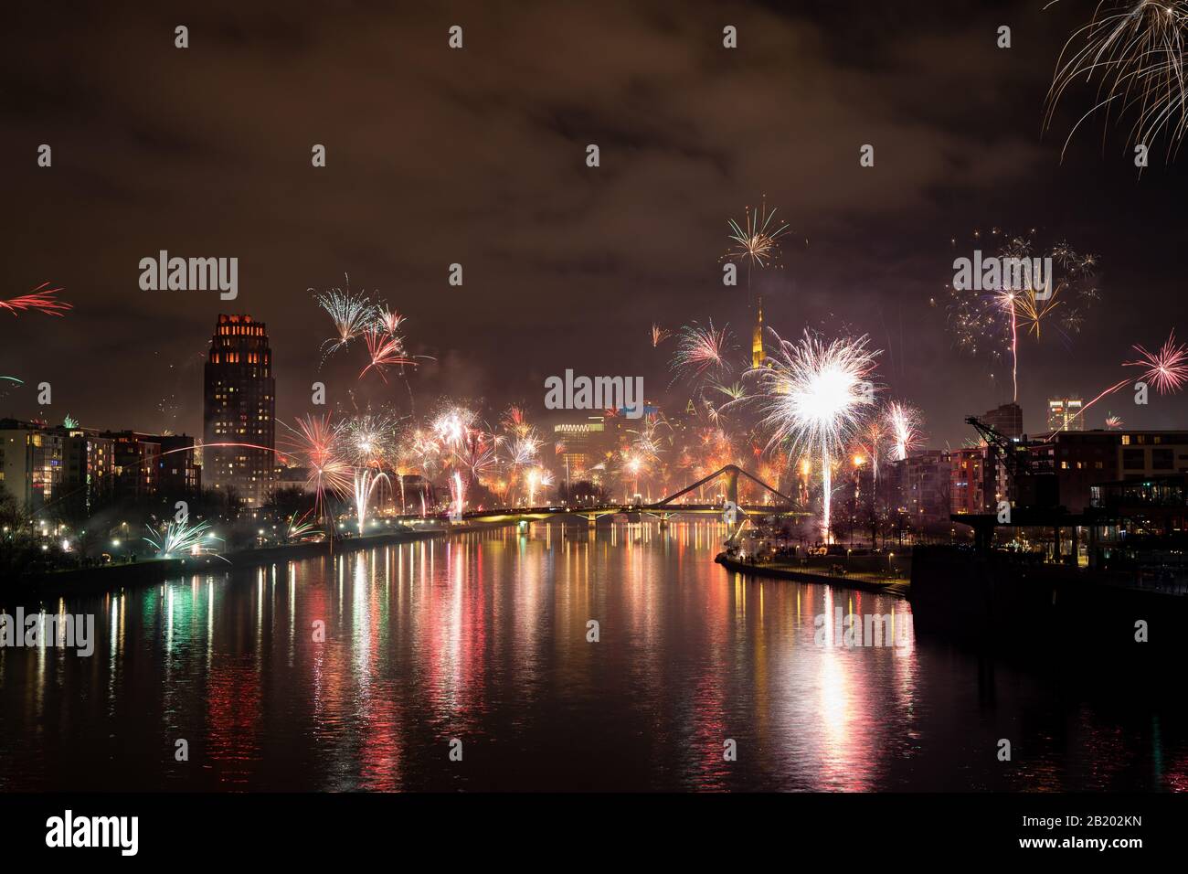 Photograph of the skyline of Frankfurt am Main and the Main river during the celebration of New Years Eve 2019/2020 Stock Photo