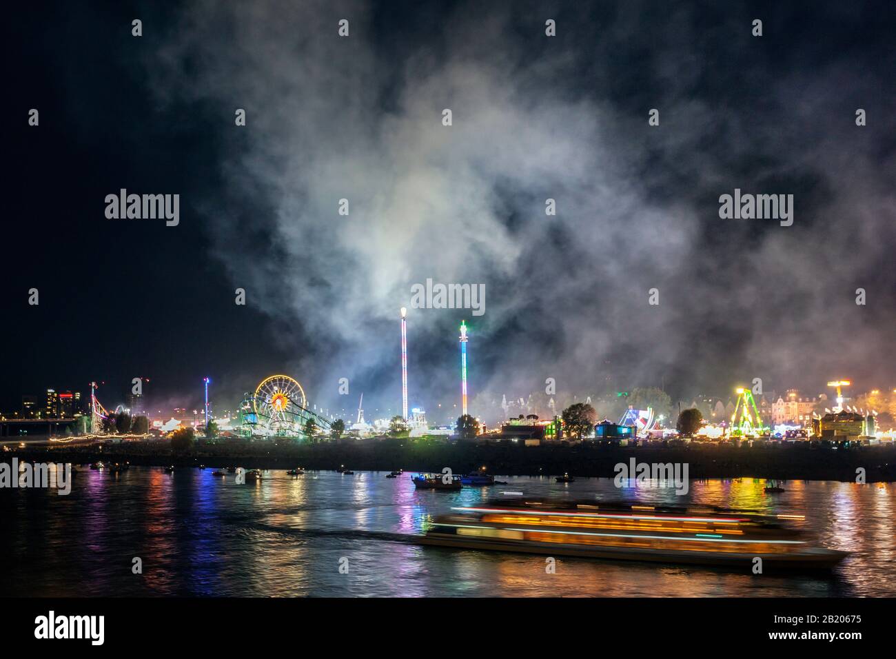 Pollution from the smoke of a large firework display during the Rhine fun fair Stock Photo