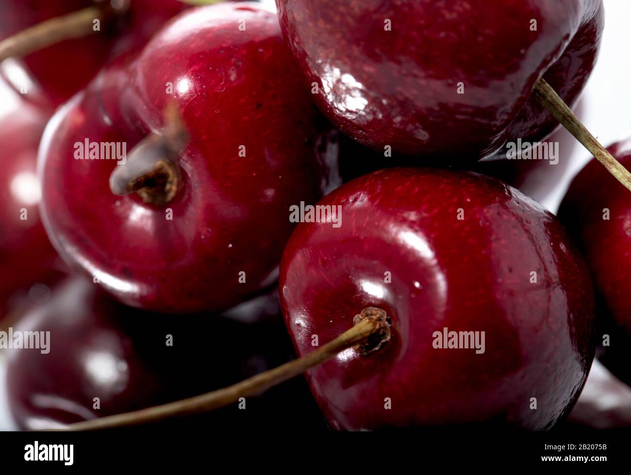 Cherries on white background closeup view Stock Photo