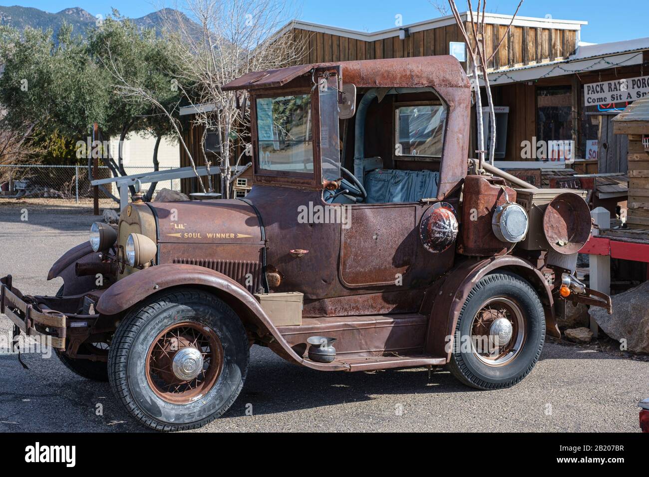 Historic vehicle on display outside Mineshaft Market in Chloride, Arizona, USA Stock Photo