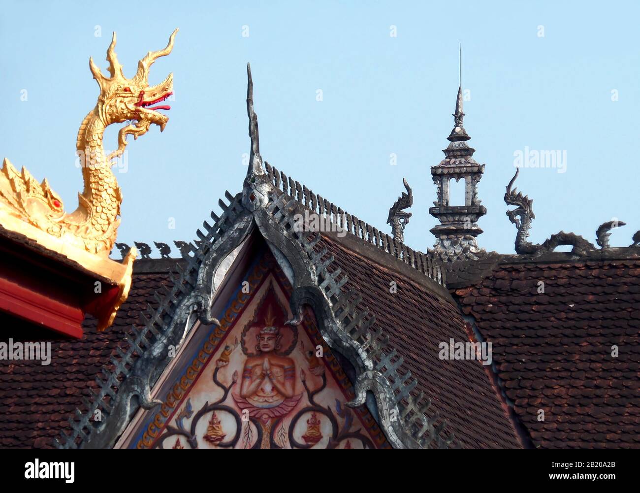 Gorgeous Old Roof with Naga Sculptures of Wat Si Saket Buddhist Temple in Vientiane, Laos Stock Photo