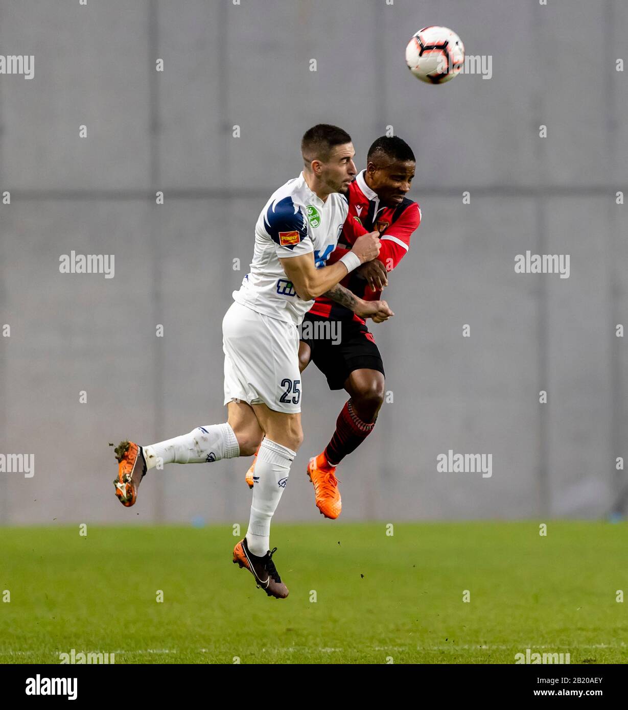 BUDAPEST, HUNGARY - FEBRUARY 22: (l-r) Zsolt Nagy of Puskas Akademia FC battles for the ball in the air with Patrick Ikenne-King of Budapest Honved during the Hungarian OTP Bank Liga match between Budapest Honved and Puskas Akademia FC at Nandor Hidegkuti Stadium on February 22, 2020 in Budapest, Hungary. Stock Photo