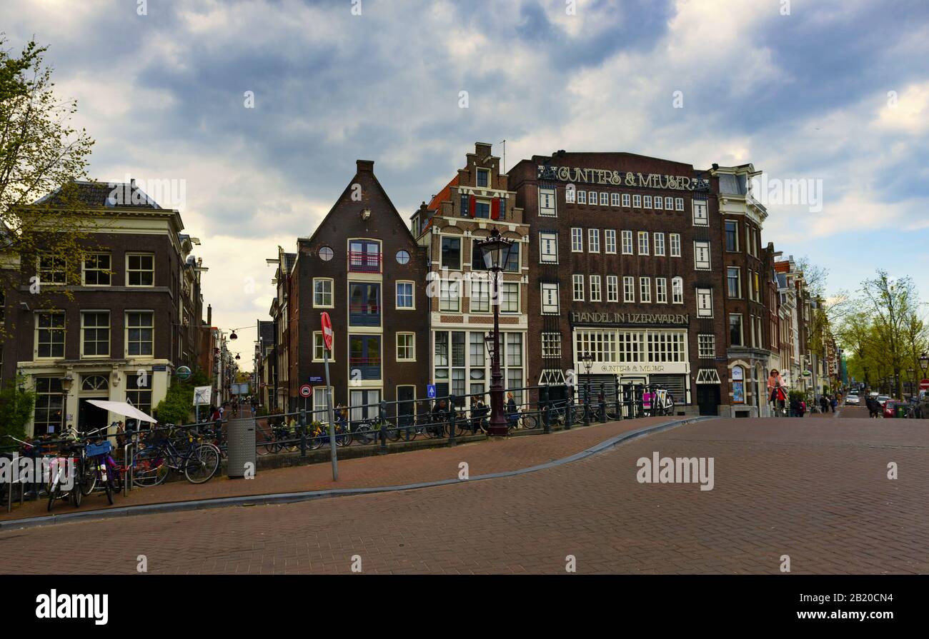 Amsterdam under spring cloudy sky Stock Photo
