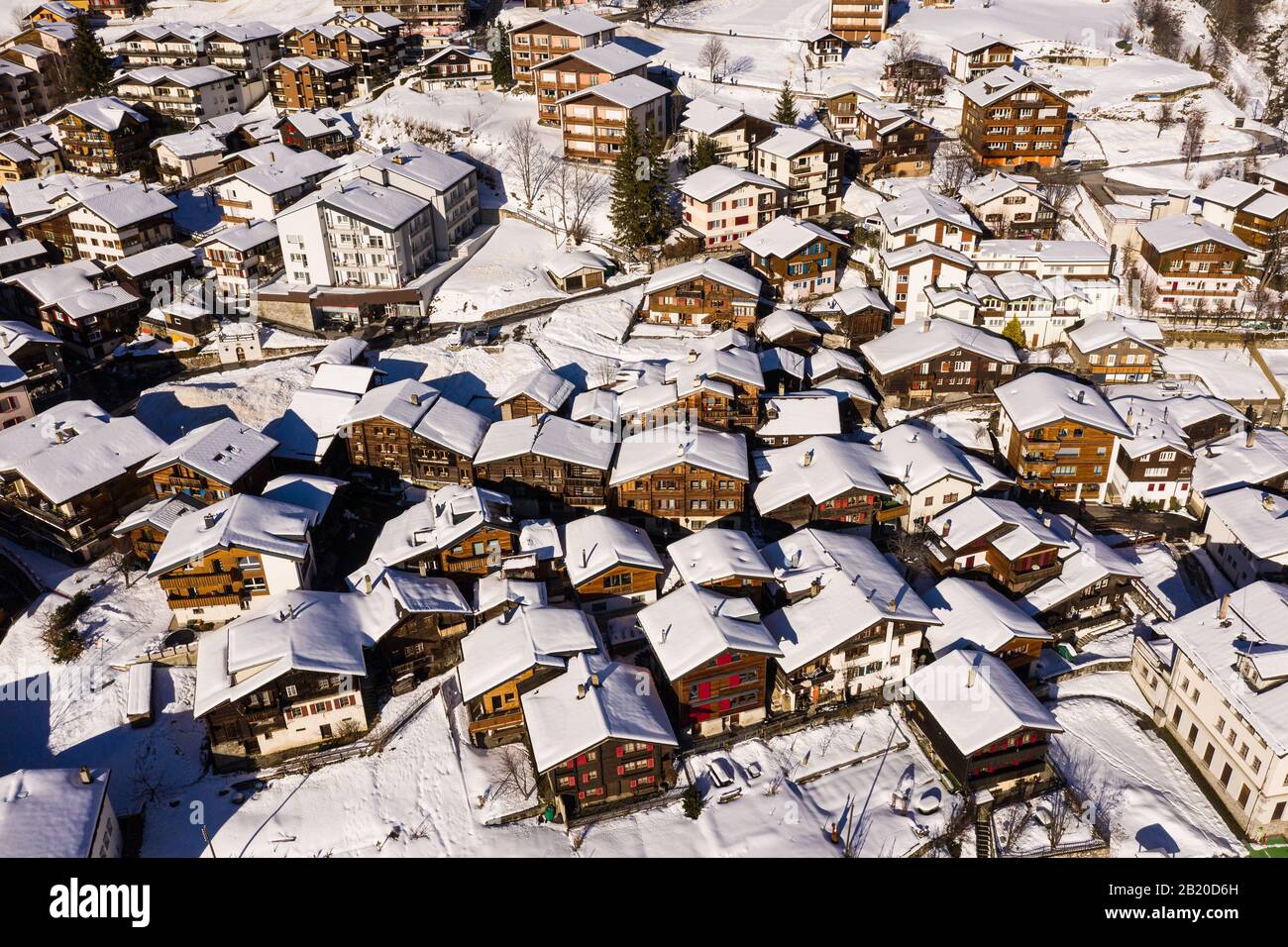 Aerial view of the snow covered Leukerbad village in the Swiss alps in Canton Valais in Switzerland Stock Photo