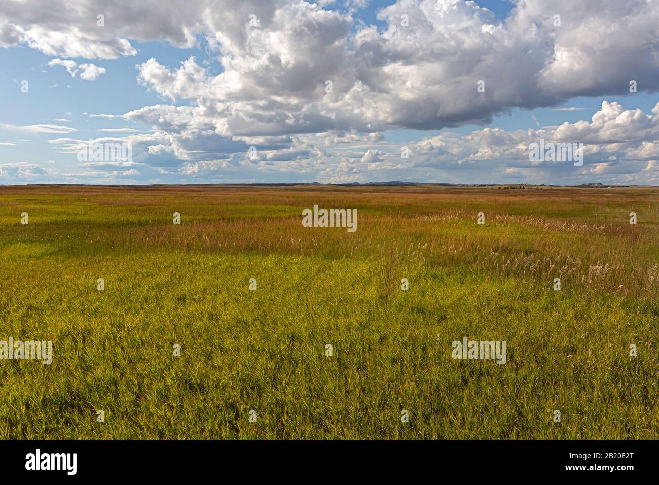 SD00220-00...SOUTH DAKOTA - Grass covered plains viewed from the Prairie Wind Overlook, a stop along the Badlands Loop Road in Badlands National Park. Stock Photo