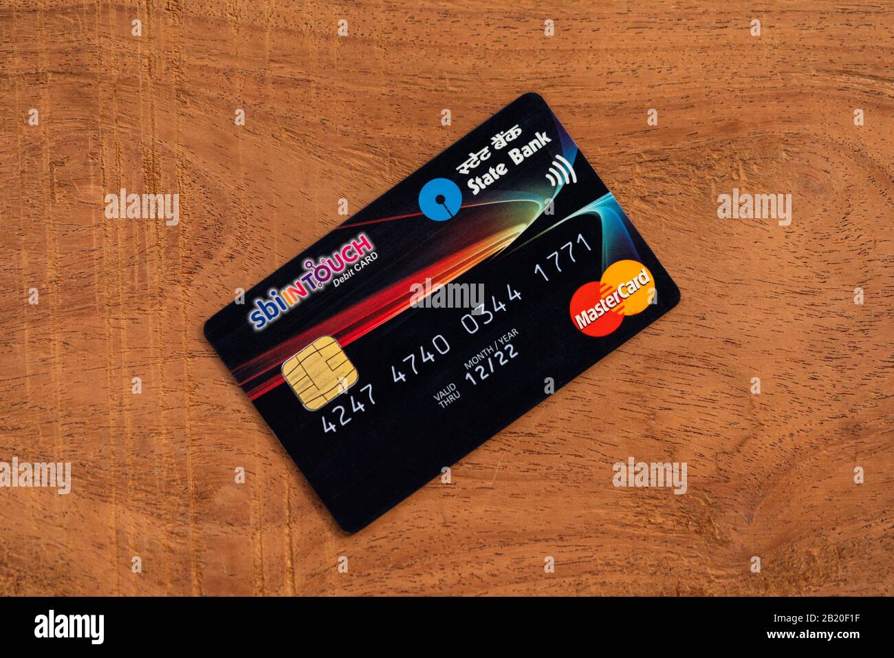 SBI master card top view on wooden background with copy space. Concept for Indian economy, IPO, banking, debit or credit card business, share market, Stock Photo