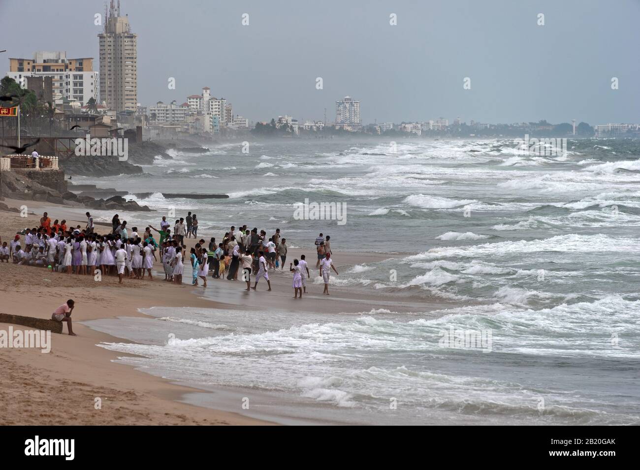 Sinhalese pupils at sunset on Galle Face beach, Colombo Stock Photo