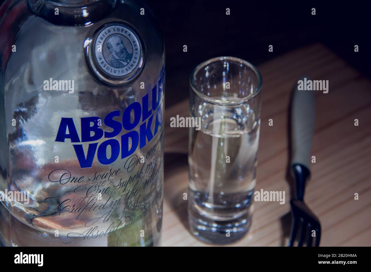 Izhevsk, Russia January 6, 2020: Bottle of Absolut vodka, a glass and a pickle appetizer Stock Photo