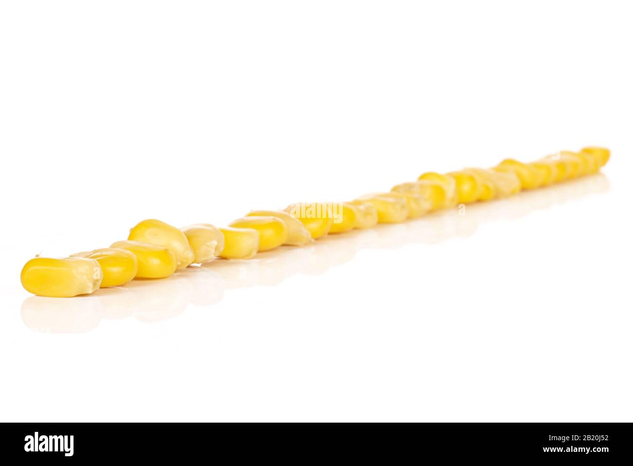 Lot of pieces of canned yellow corn diagonal isolated on white ...