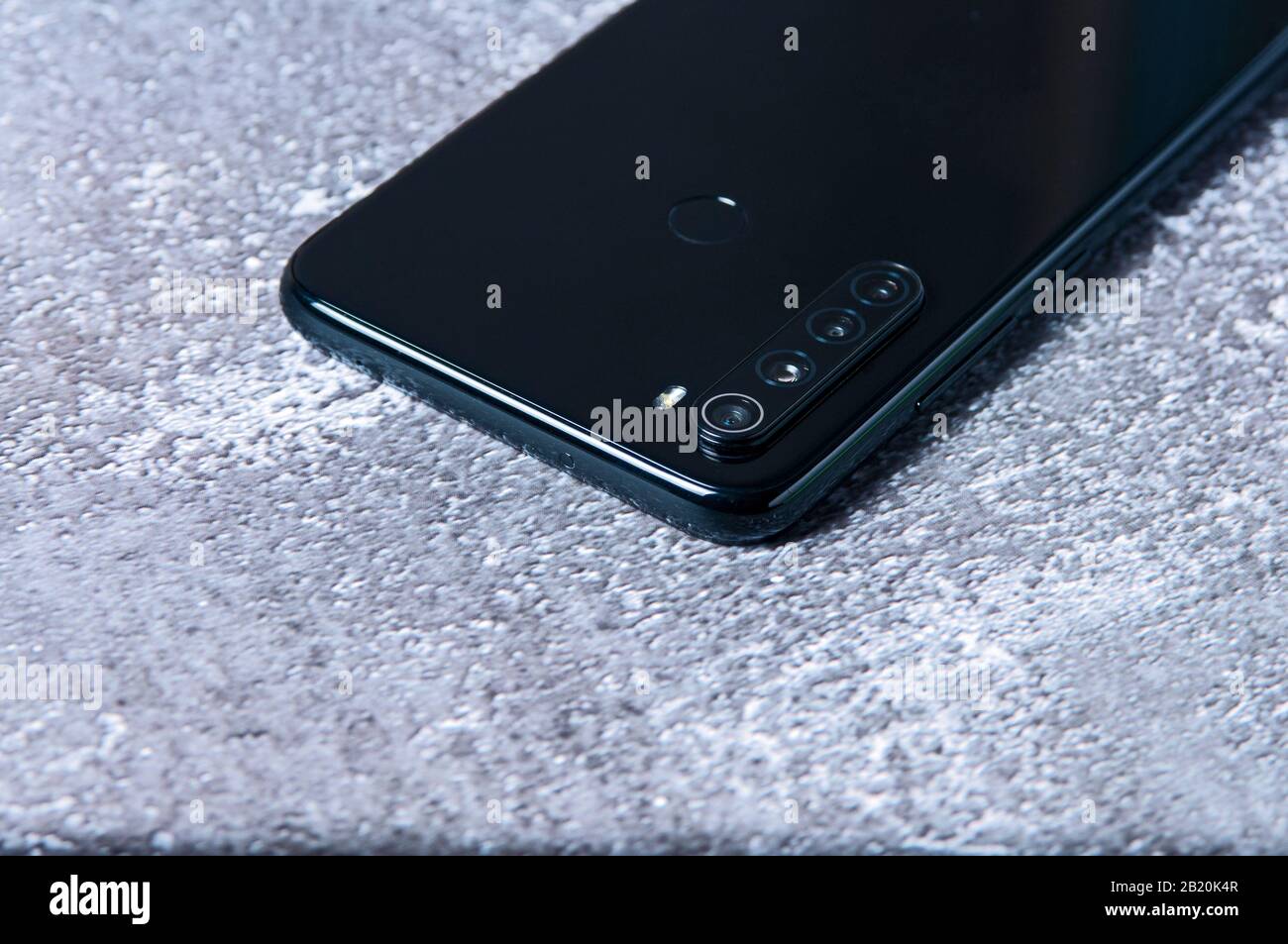 Mobile phone with four cameras. Modern device Stock Photo Alamy