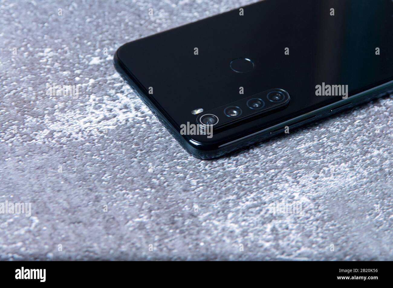 Mobile phone with four cameras. Modern device Stock Photo Alamy