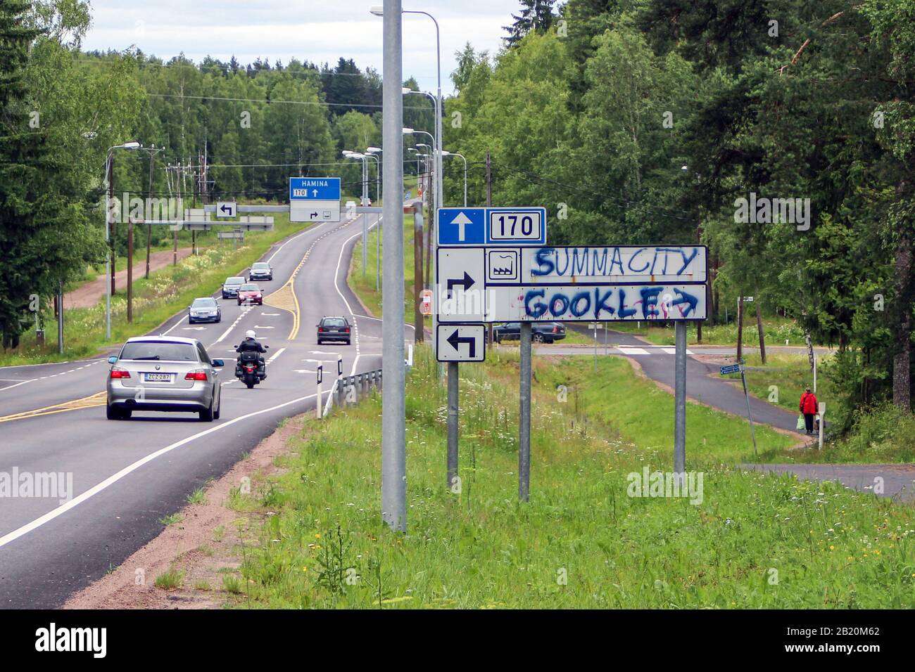Spray-painted driving direction sign pointing the way to Google data center, former pulp factory or paper mill, in Summa district of Hamina, Finland Stock Photo