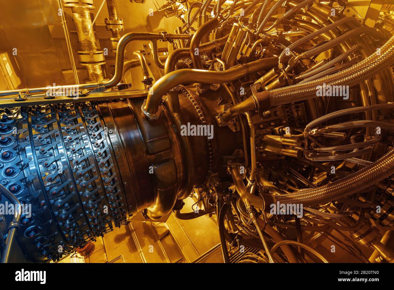 Gas turbine engine of feed gas compressor located inside pressurized