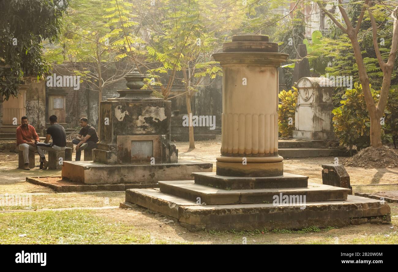 Kolkata, West Bengal/India - January 26 2018: People hang around the gothic, Indo-Saracenic tombs of the South Park Street Cemetery. Stock Photo