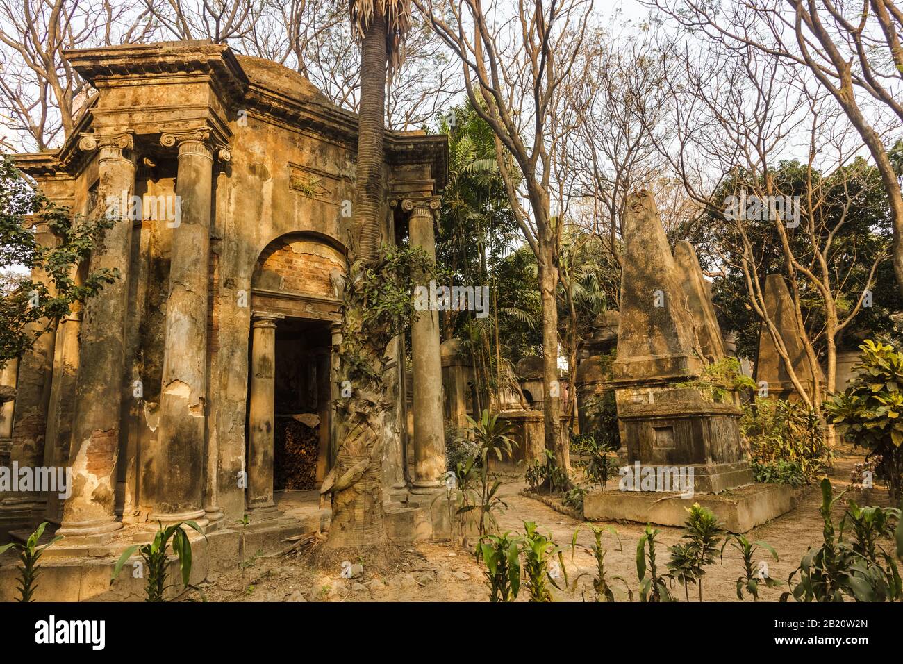 Kolkata, West Bengal/India - January 26 2018: The gothic, Indo-Saracenic tombs surrounded by trees inside the South Park Street Cemetary. Stock Photo