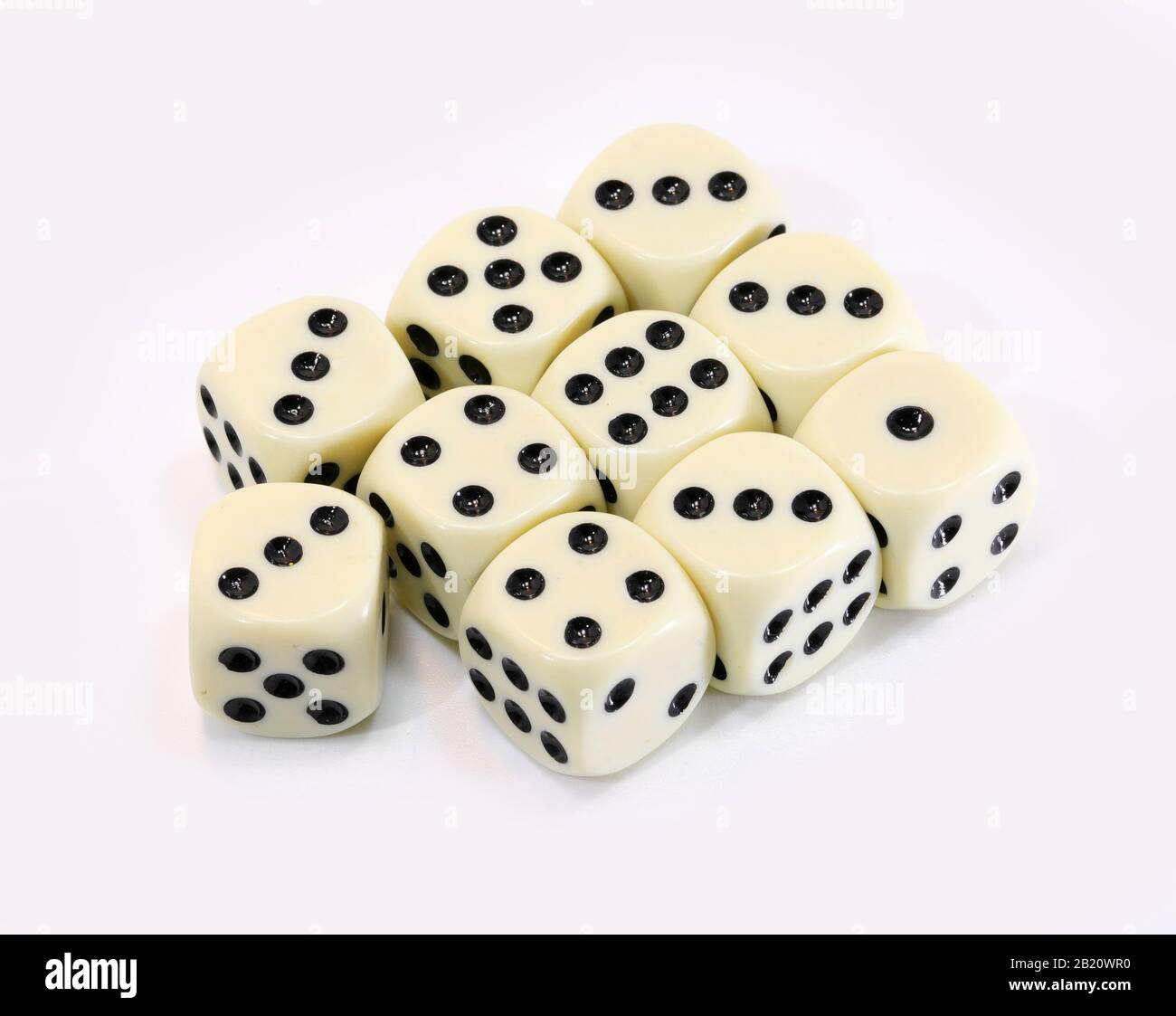 many dice on a white background of a gambler Stock Photo Alamy