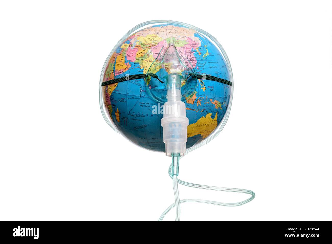 Save The World. Conceptual image, earth globe with an inhaler mask, isolated on a white background. Human Epidemic Danger. Stock Photo