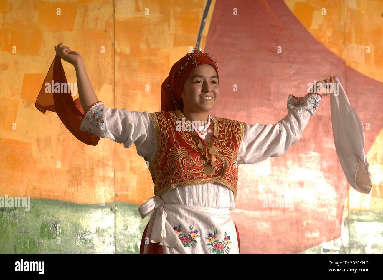 Austin, Texas November 12, 2005: Turkish dancer performs at the End of Ramadan (Eid) Festival for the Muslim community of central Texas, which welcomes all faiths to a gathering showcasing food, dancing and festivities of the Muslim world. ©Bob Daemmrich Stock Photo